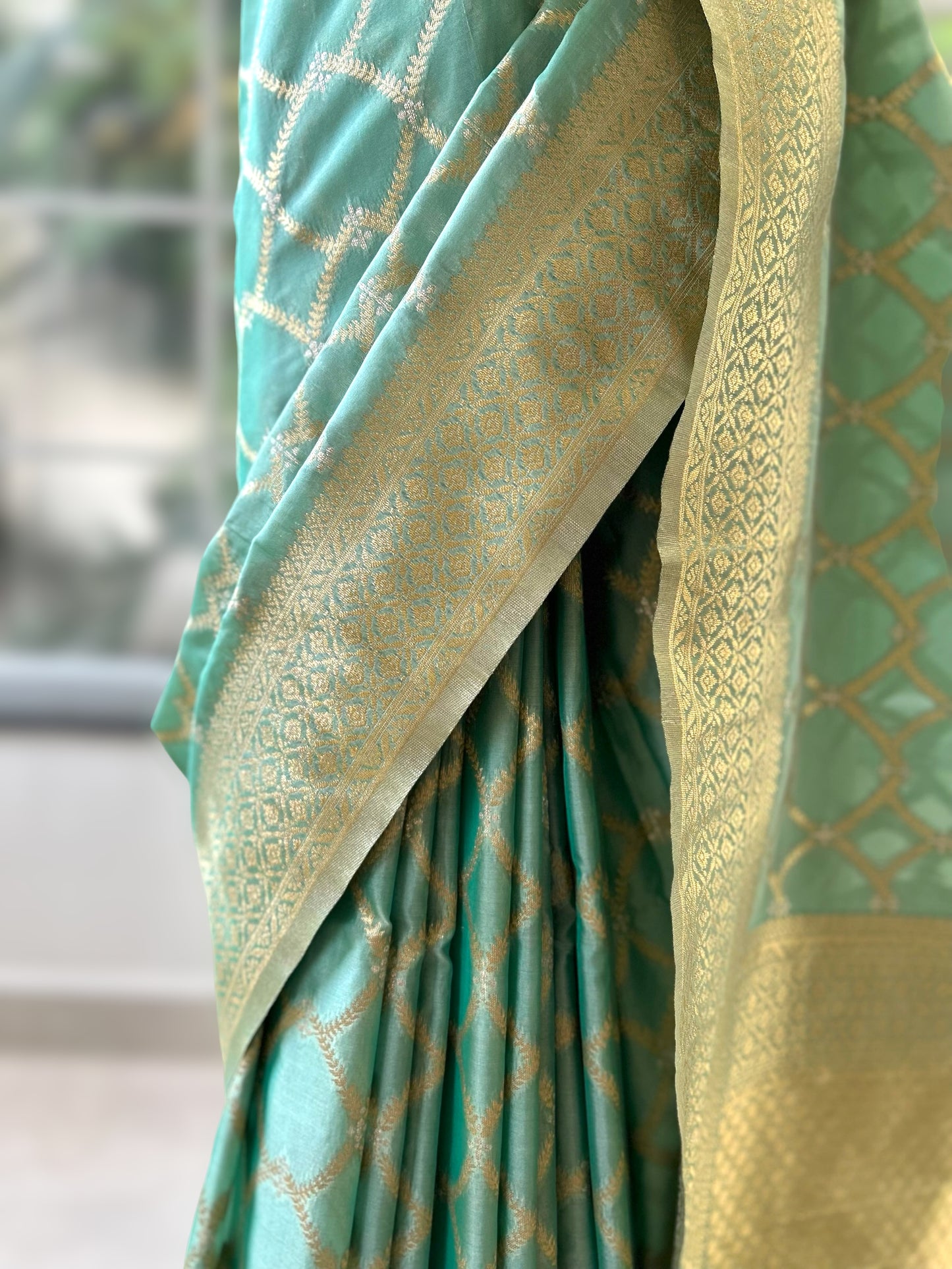 Sea green crepe silk saree