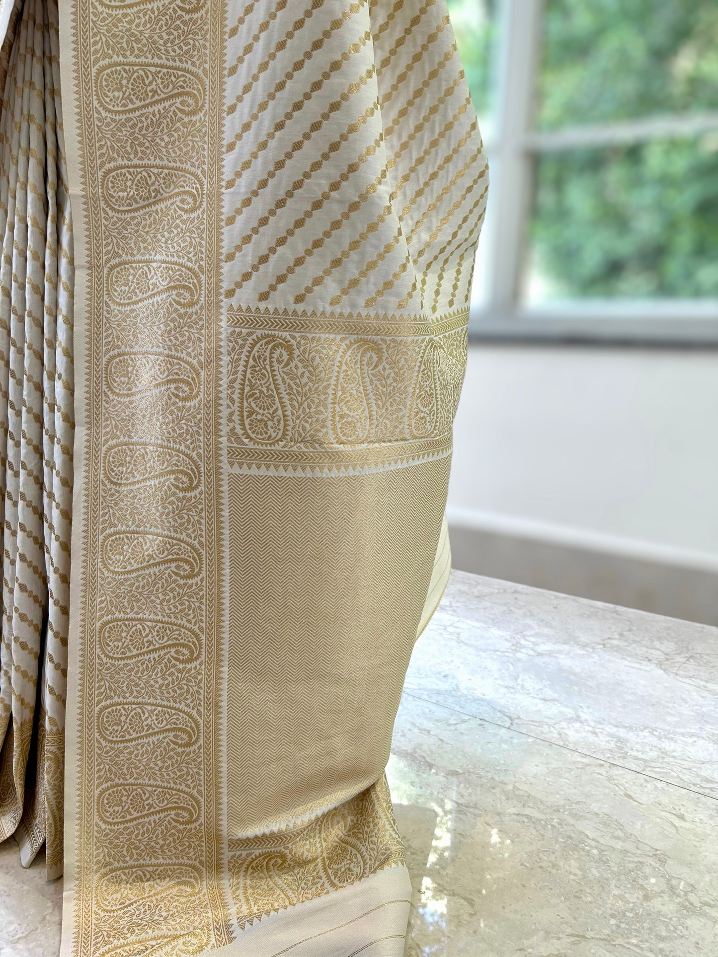 White and gold soft silk saree