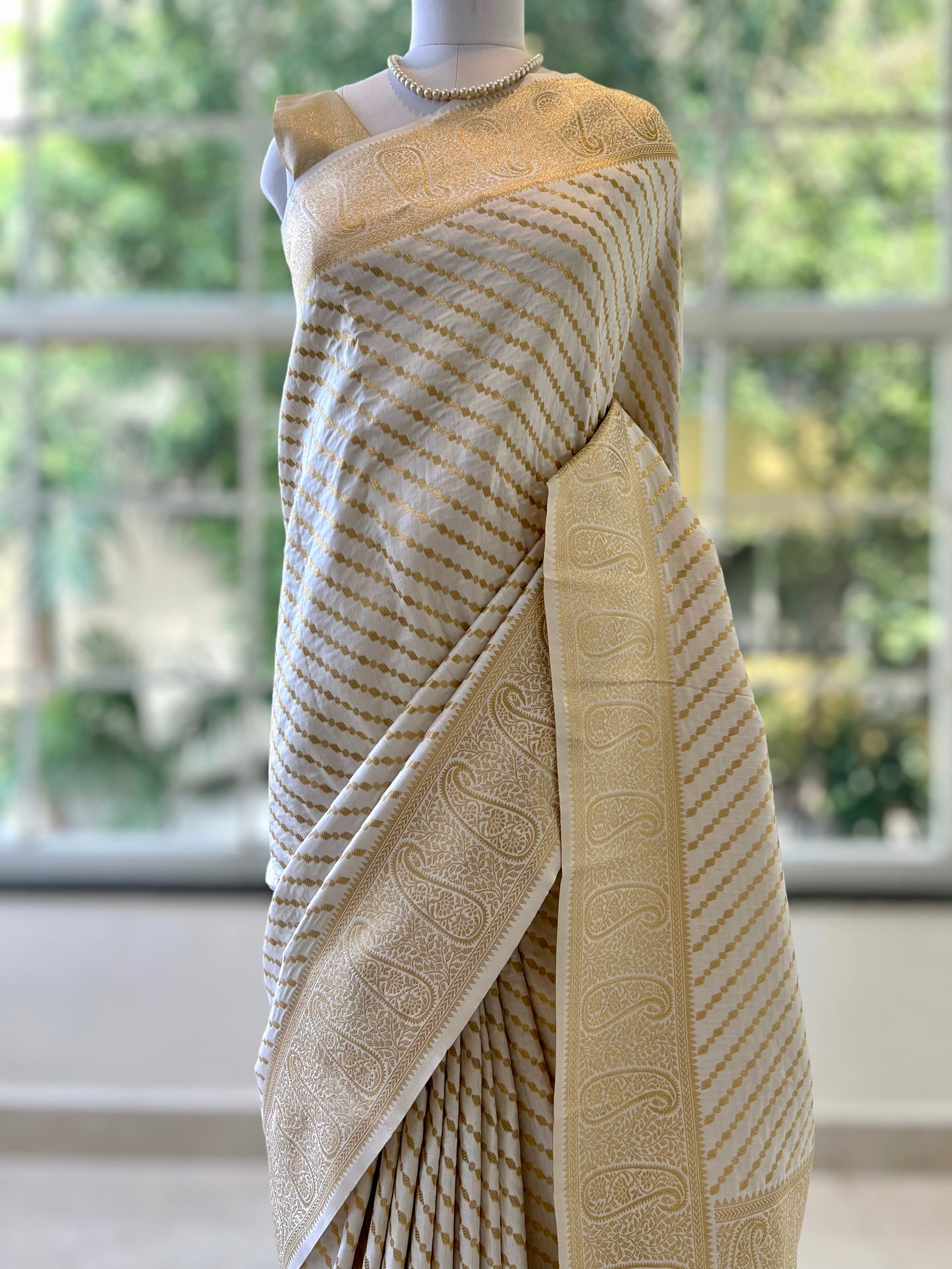 White and gold soft silk saree