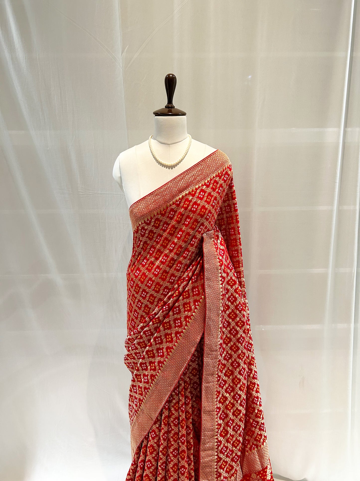 Red bandhani saree