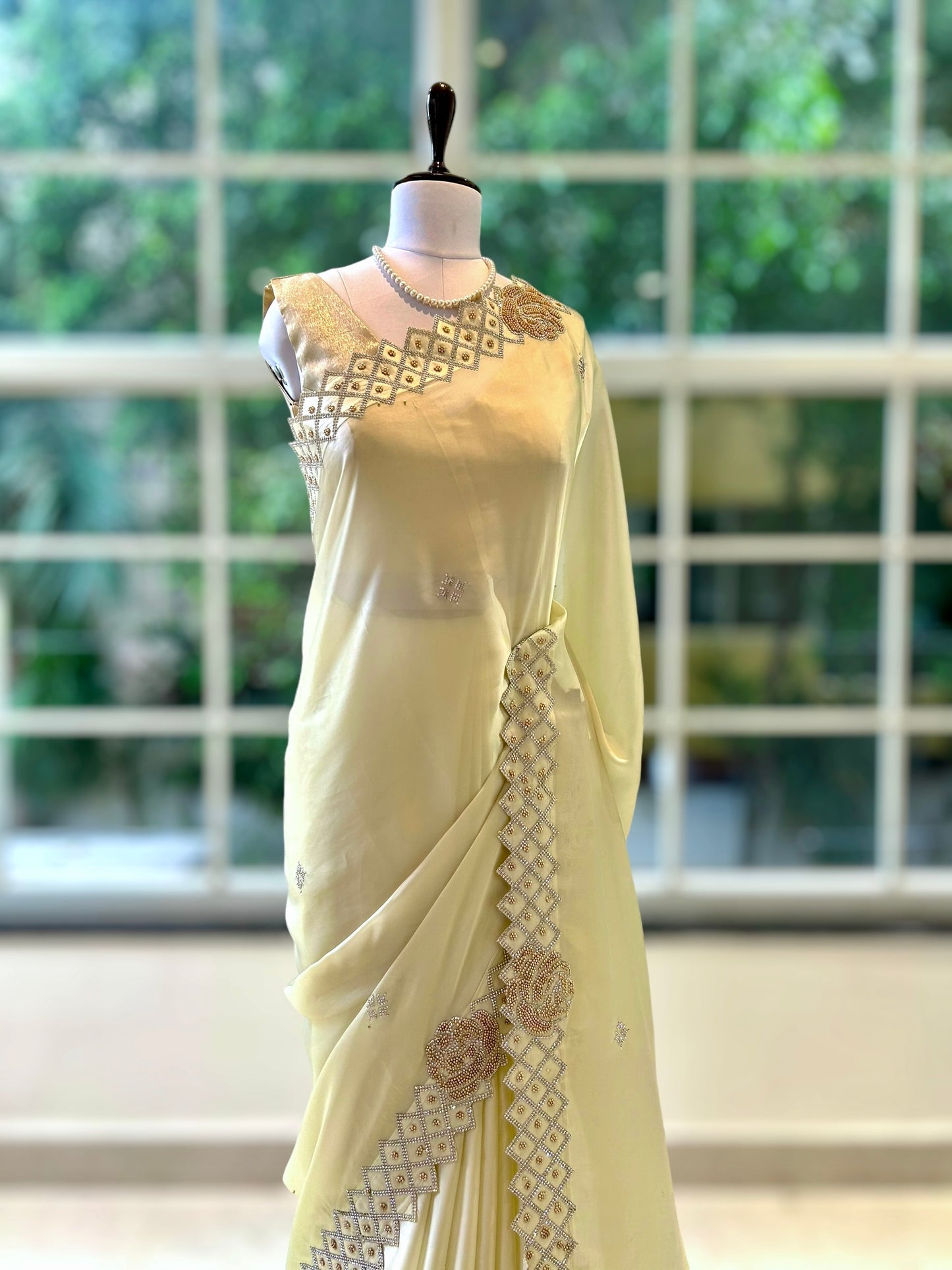 Cream rose embellished satin saree