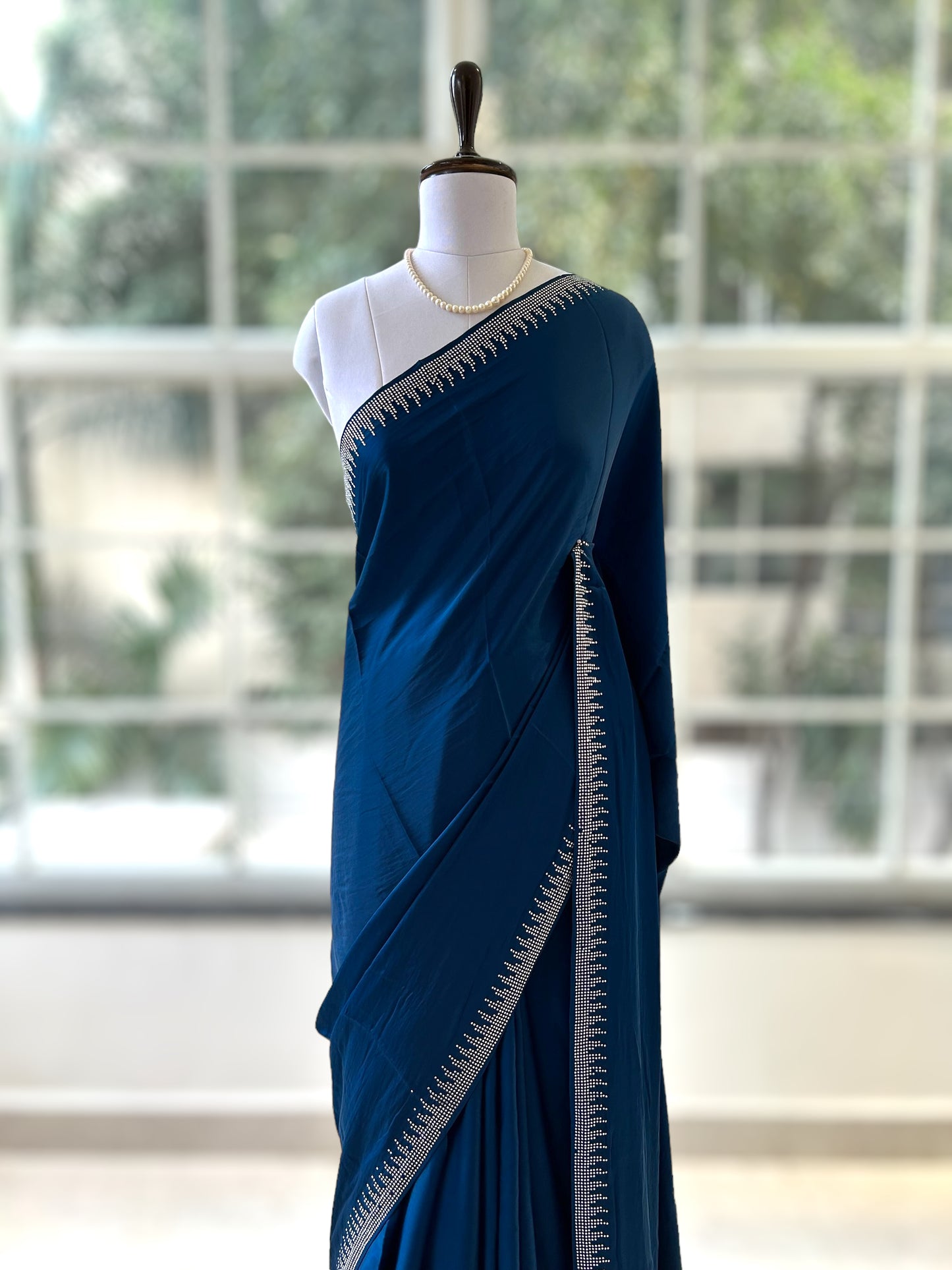 Teal blue satin saree