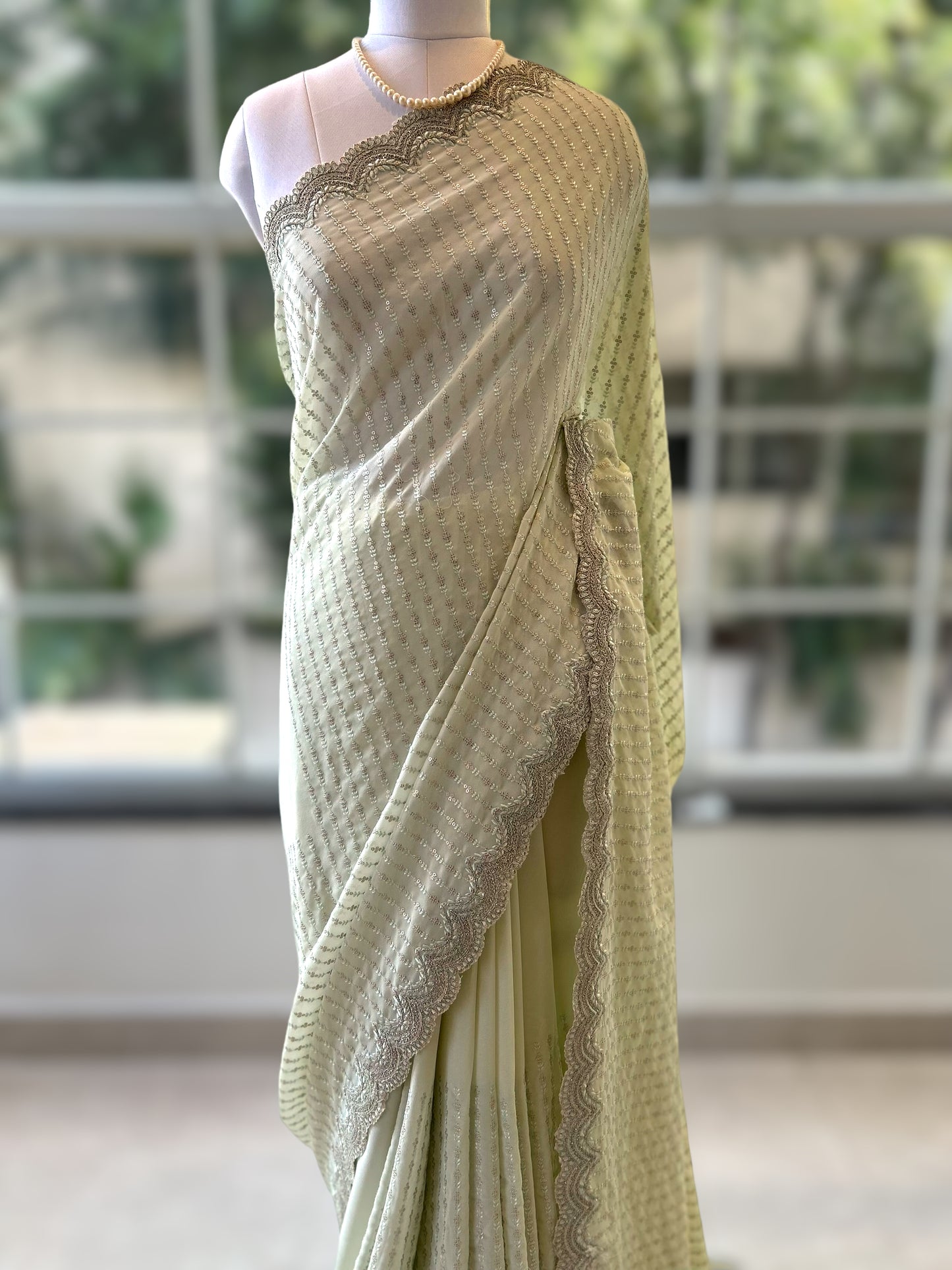 Mint green sequins saree