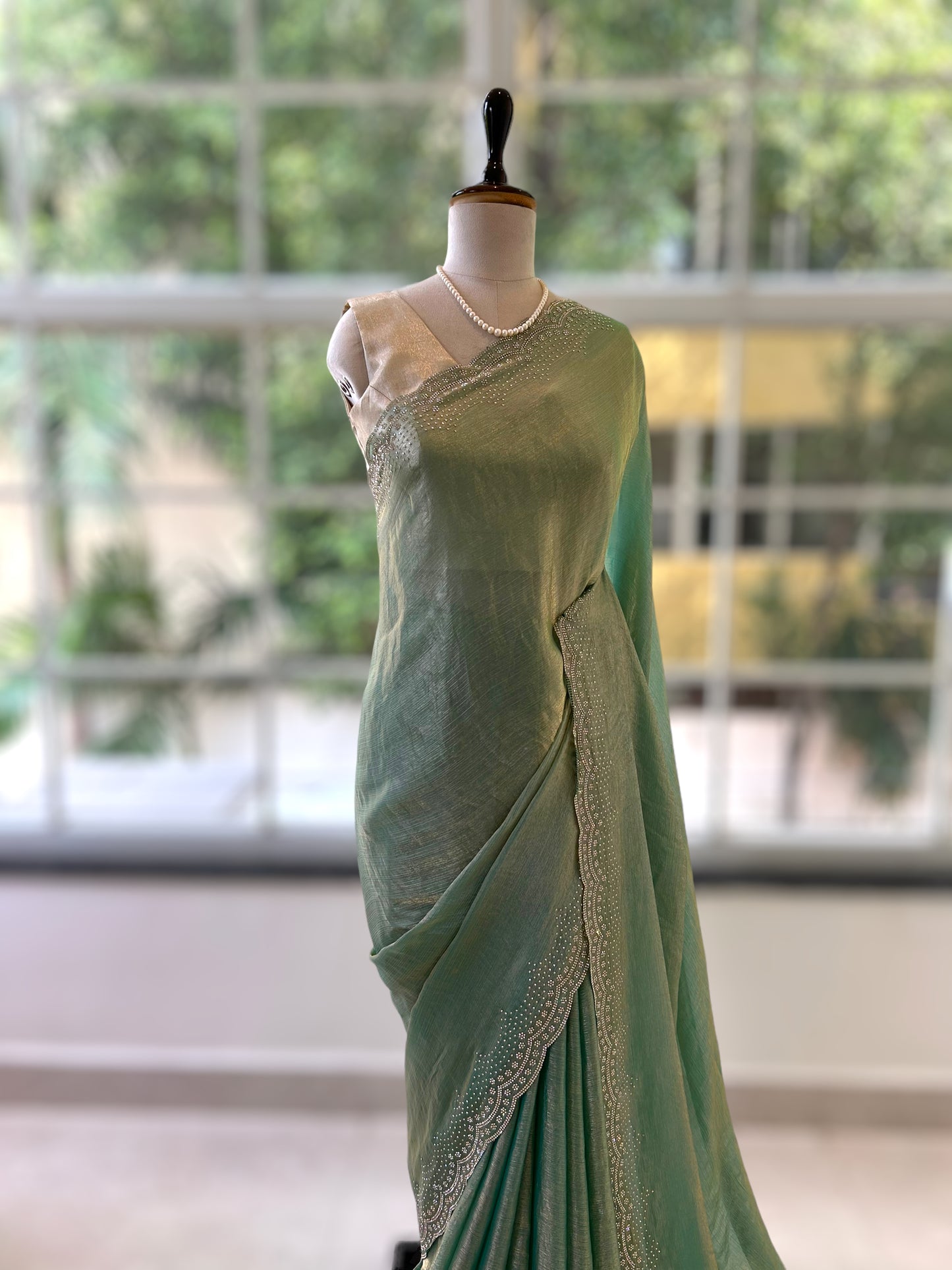 Emerald green shimmer chiffon saree