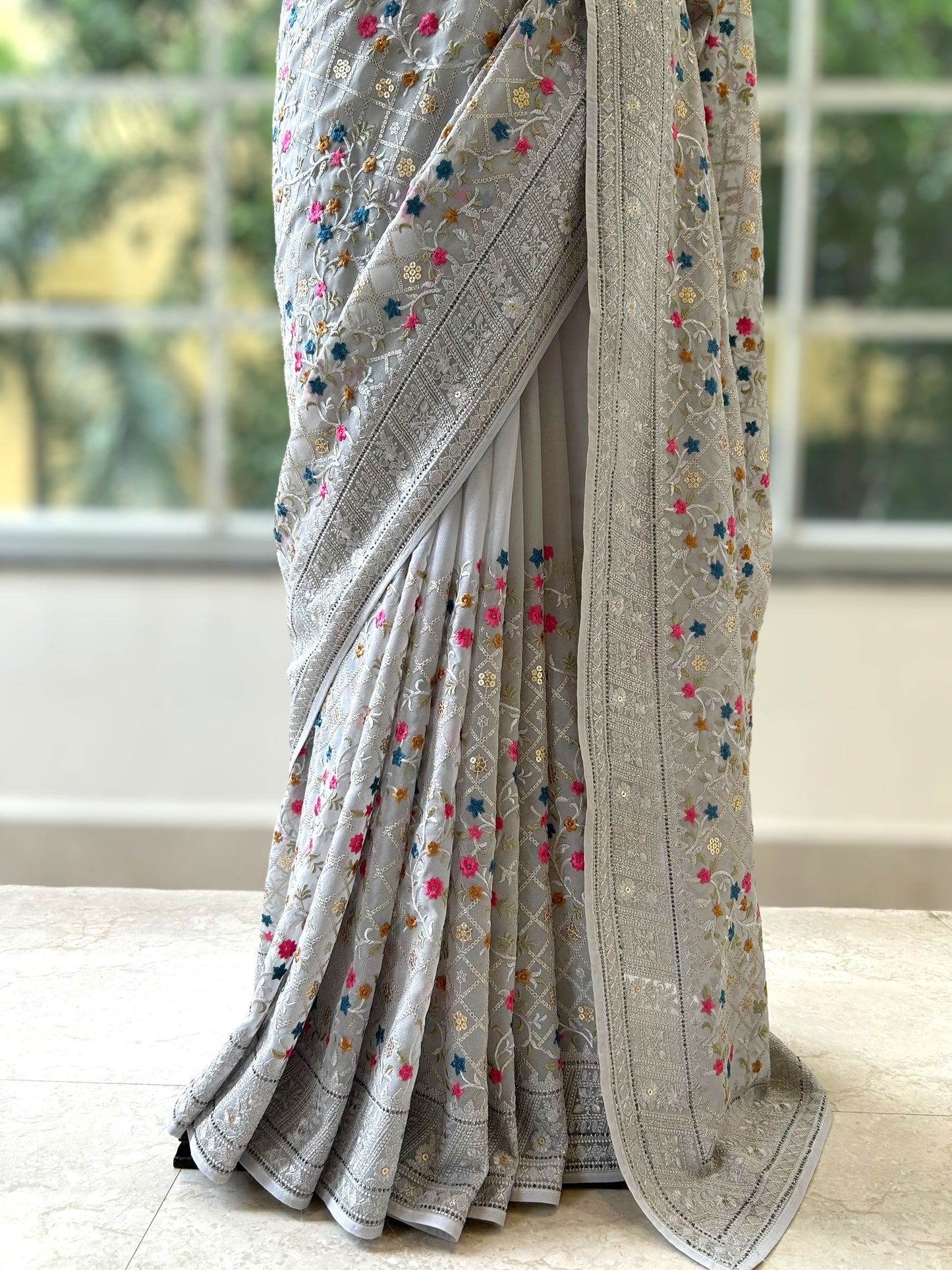 Floral embroidered georgette saree - Grey