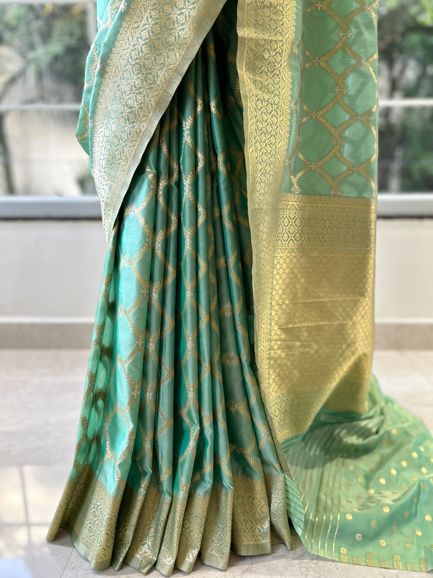 Sea green crepe silk saree