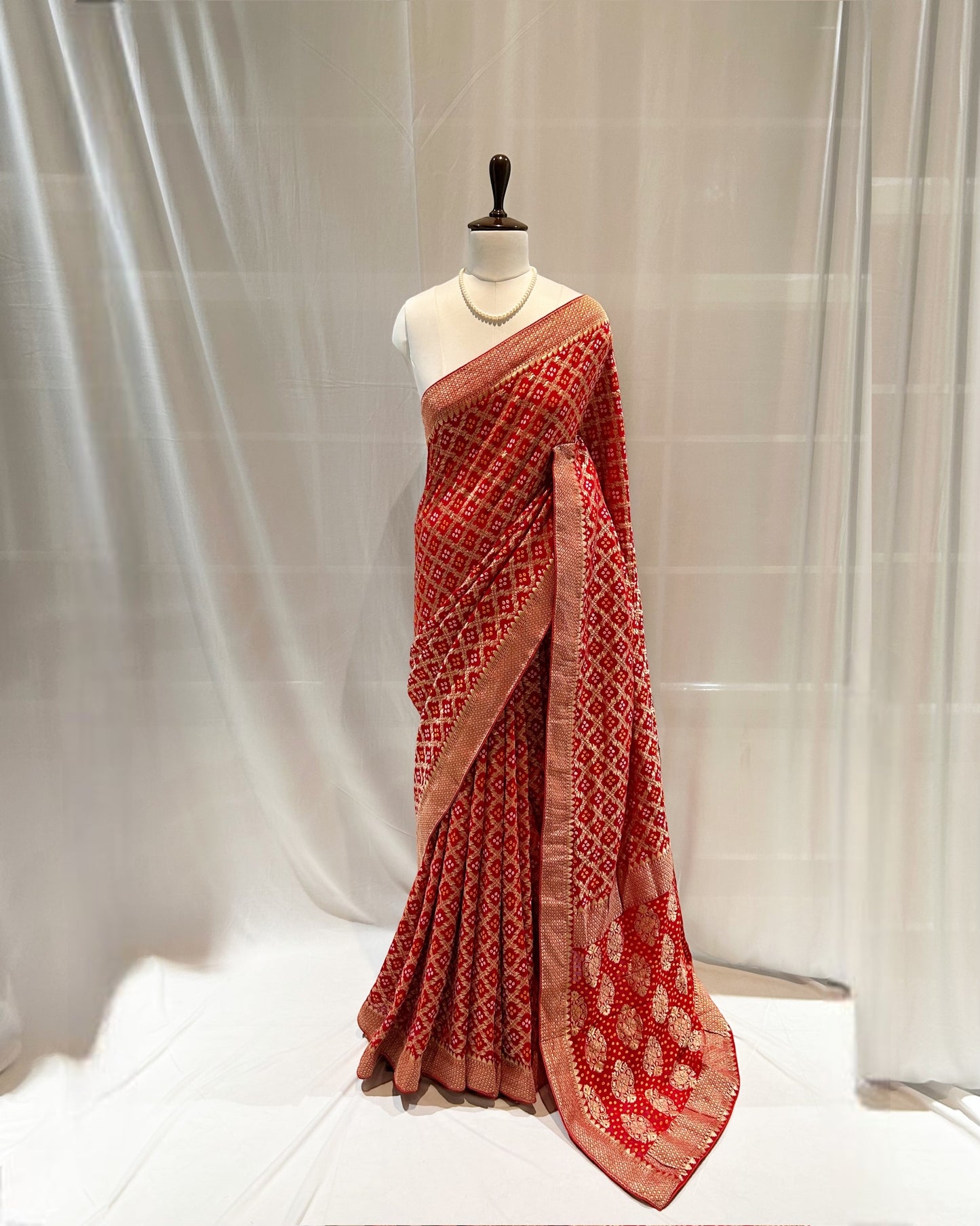 Red bandhani saree