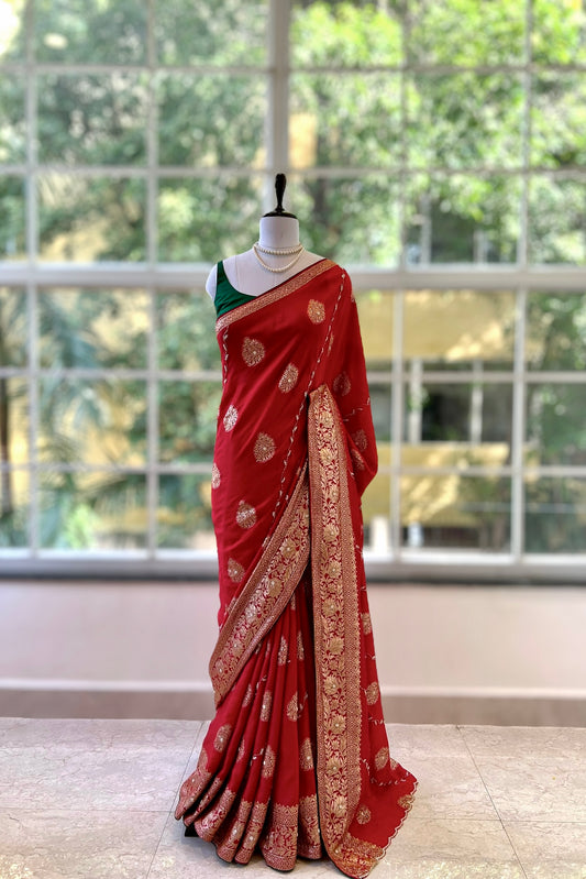 Red pearls embellished saree