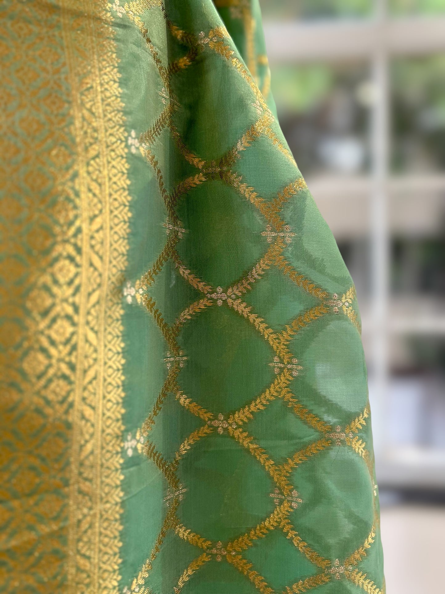 Sea green crepe silk saree