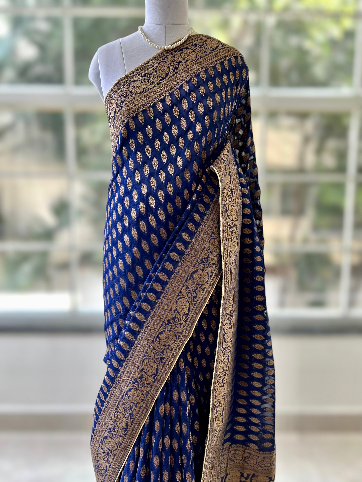 Peacock blue georgette saree