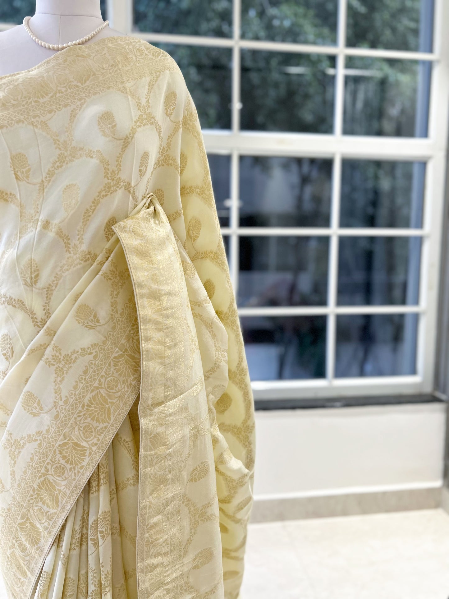 Off white pure dola silk saree