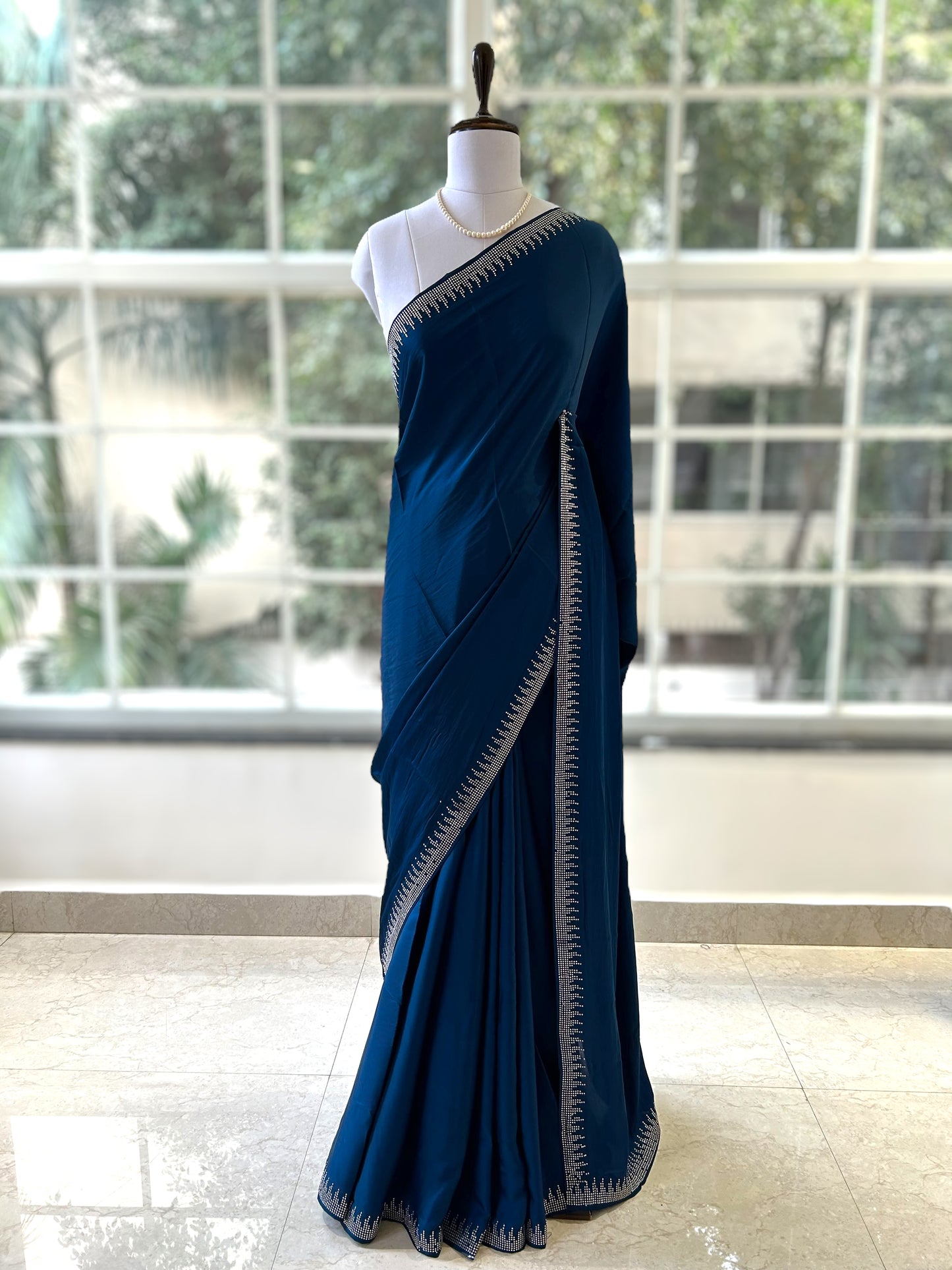 Teal blue satin saree