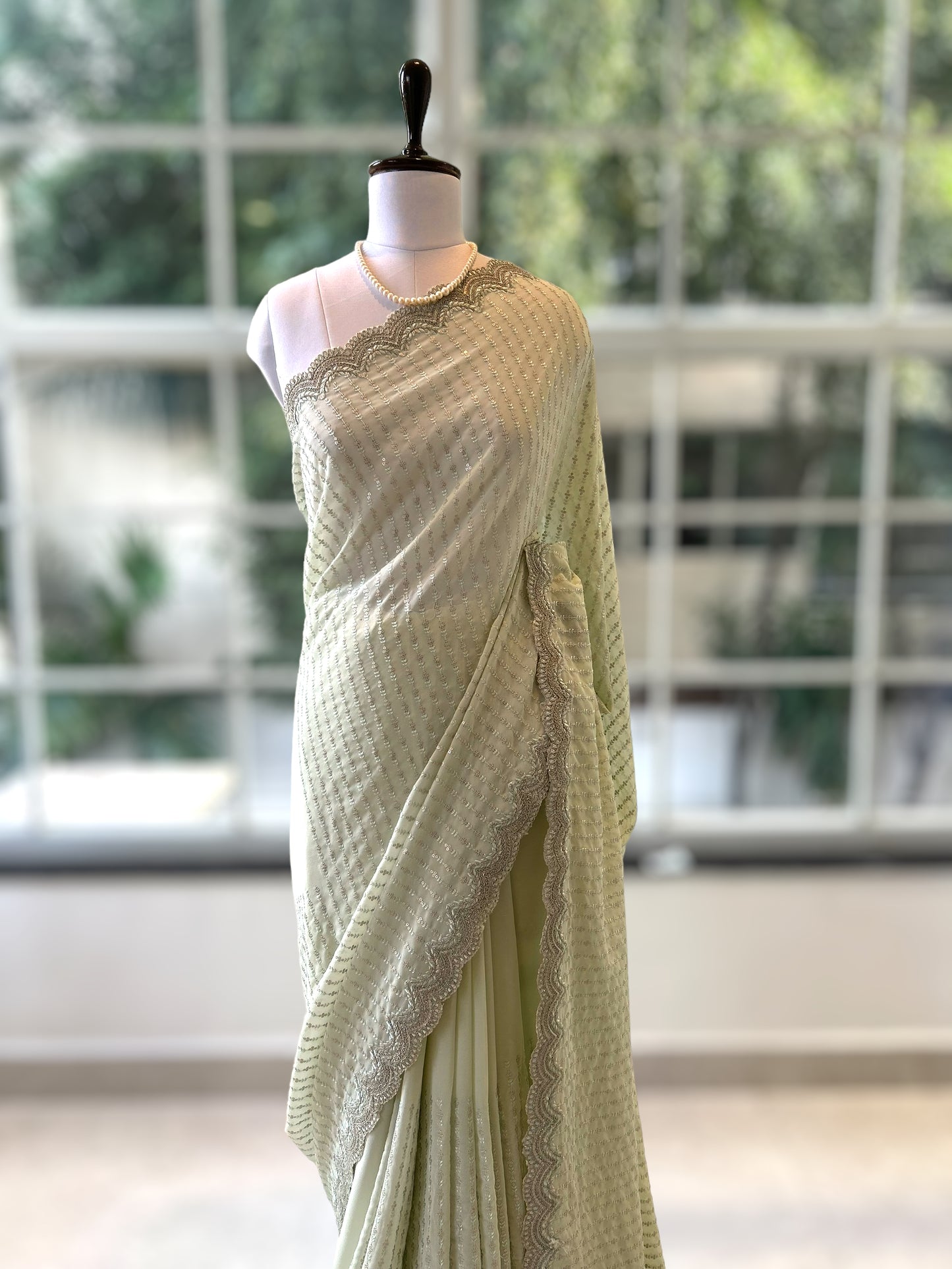 Mint green sequins saree