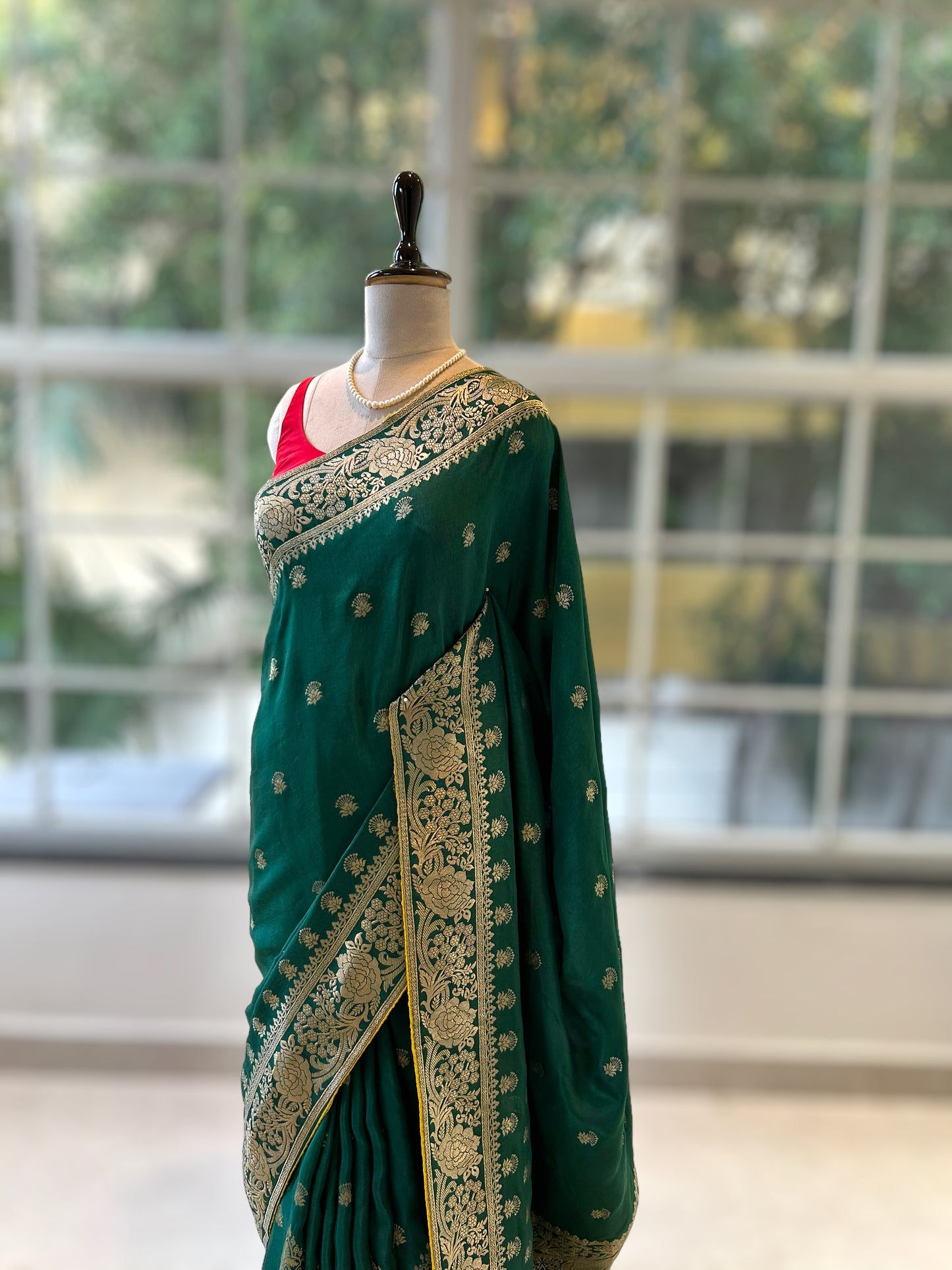 Bottle green zariwork saree