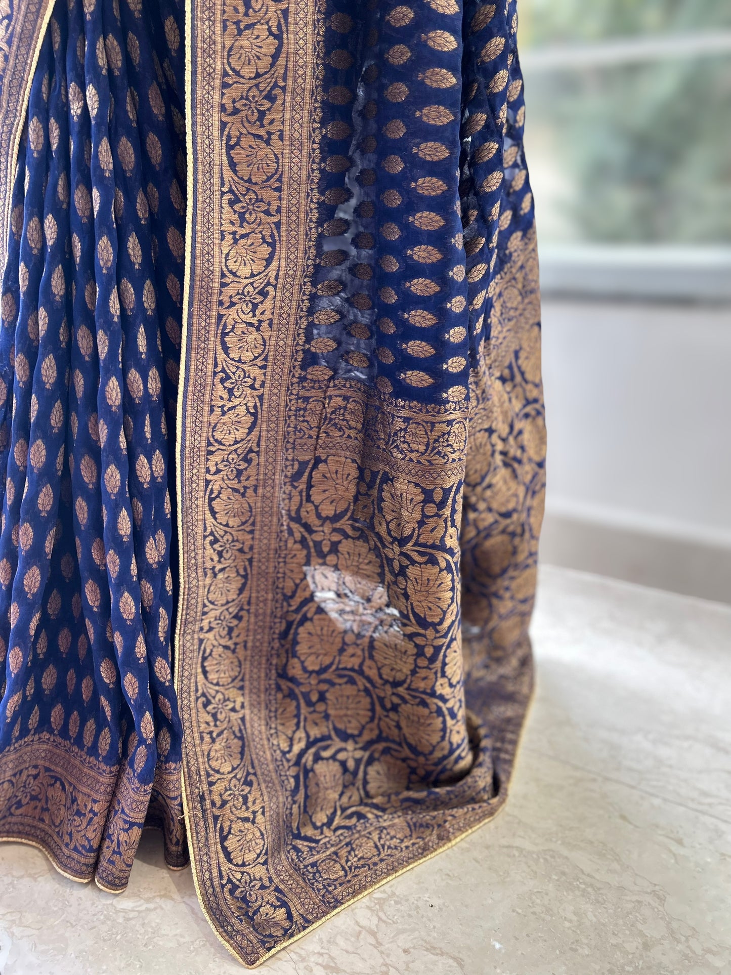 Peacock blue georgette saree