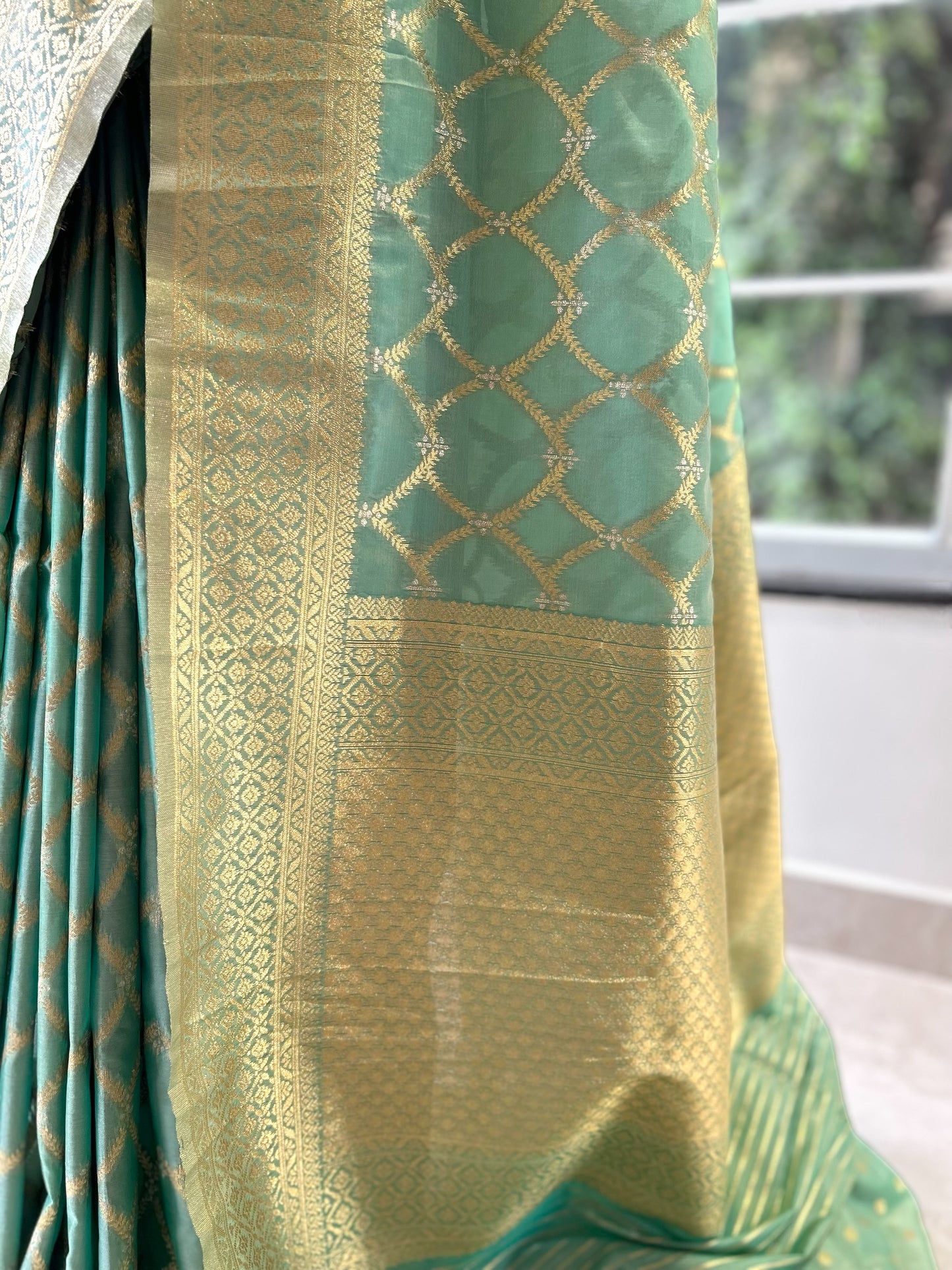 Sea green crepe silk saree