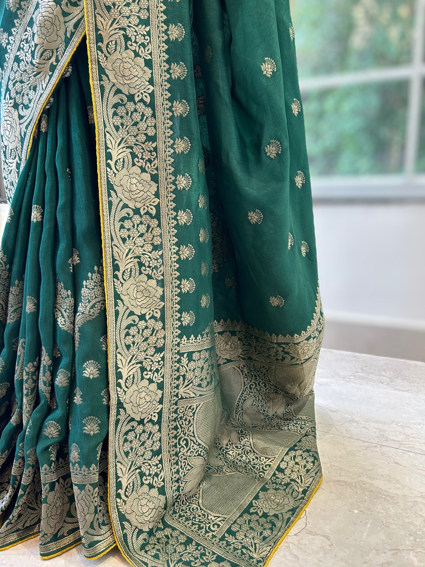 Bottle green zariwork saree