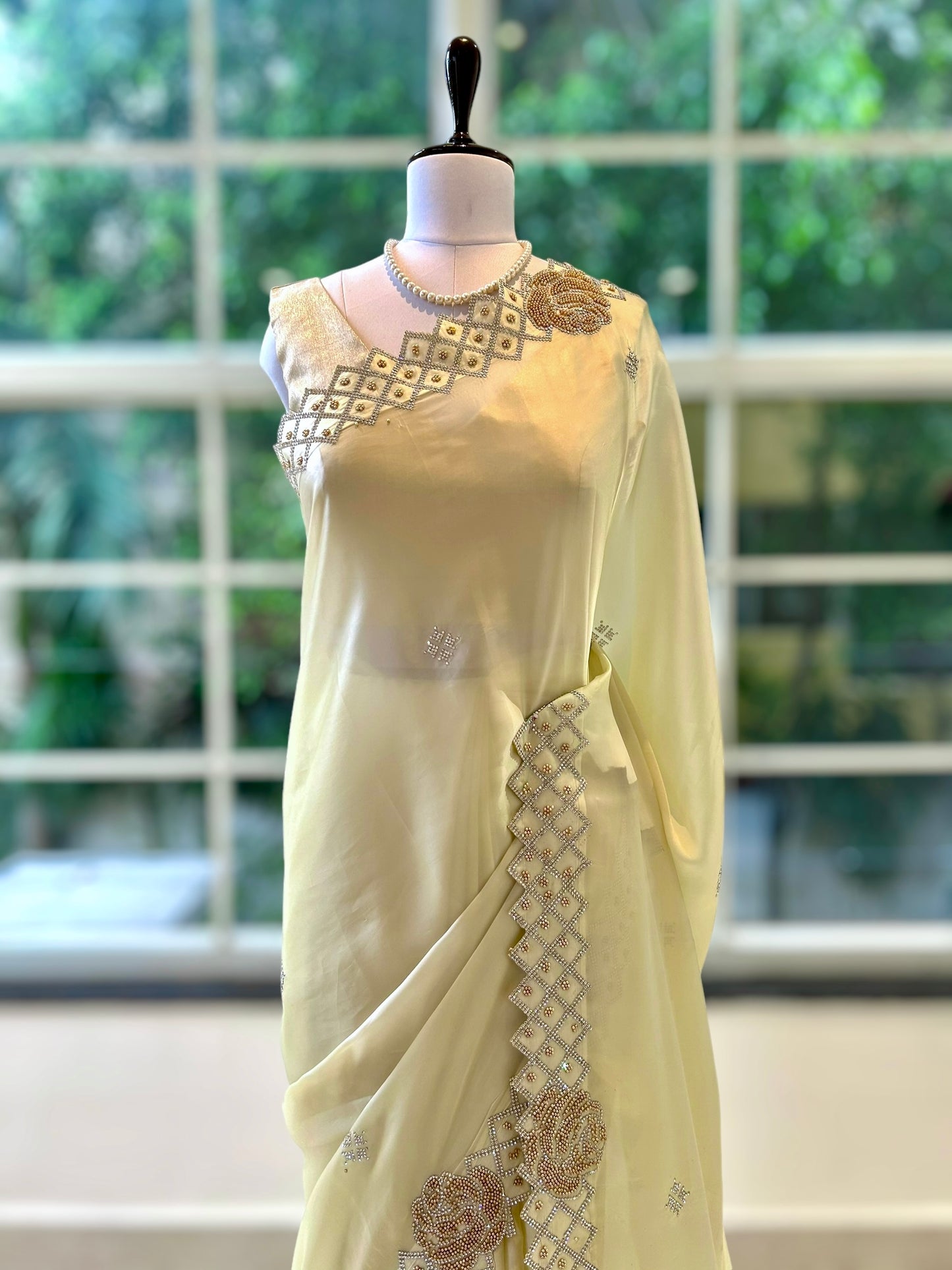 Cream rose embellished satin saree