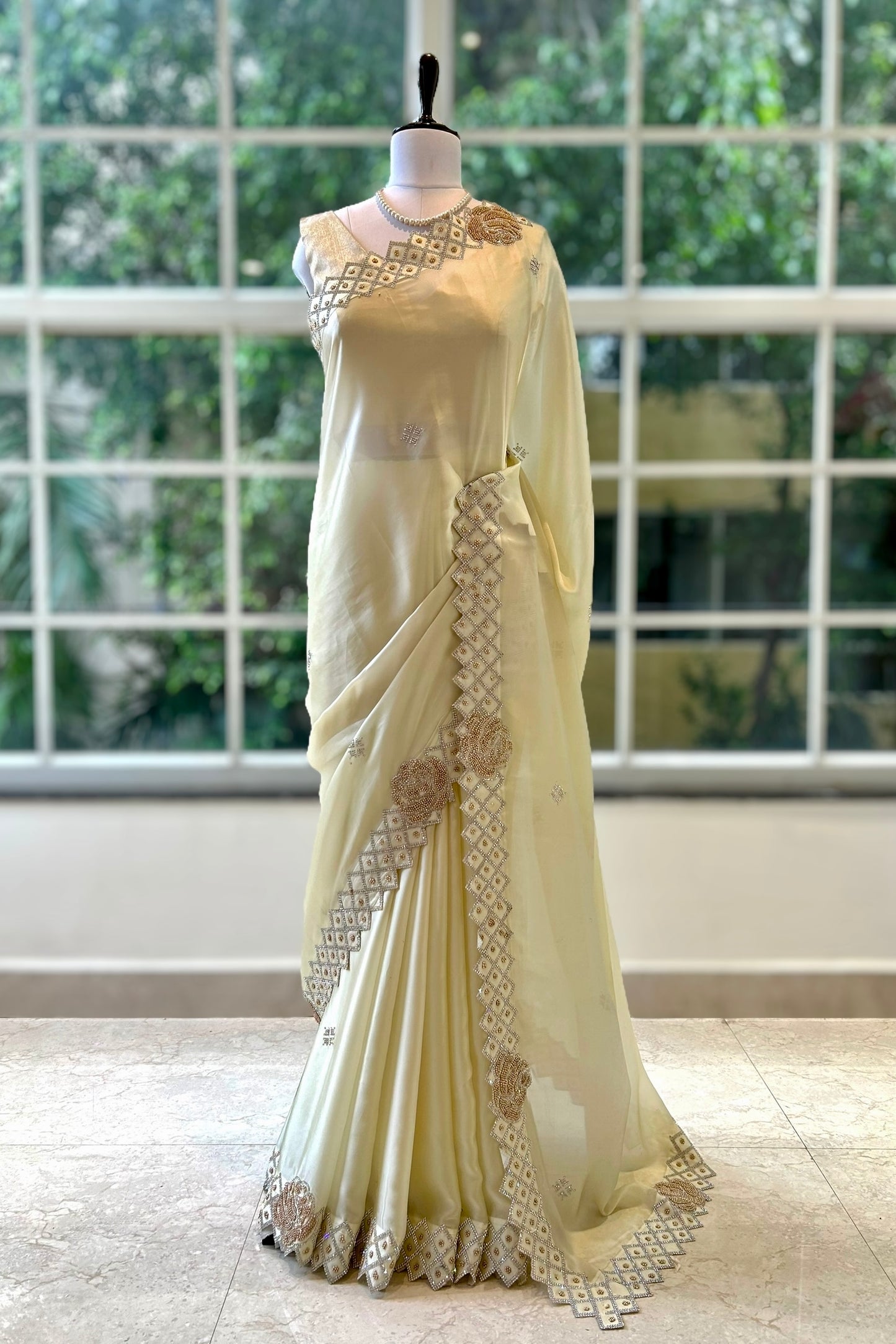 Cream rose embellished satin saree