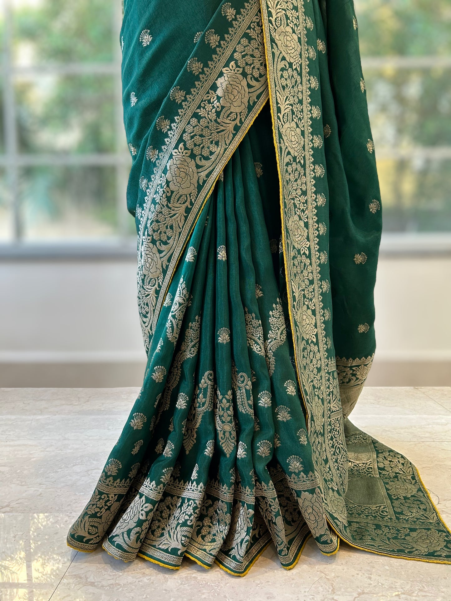 Bottle green zariwork saree