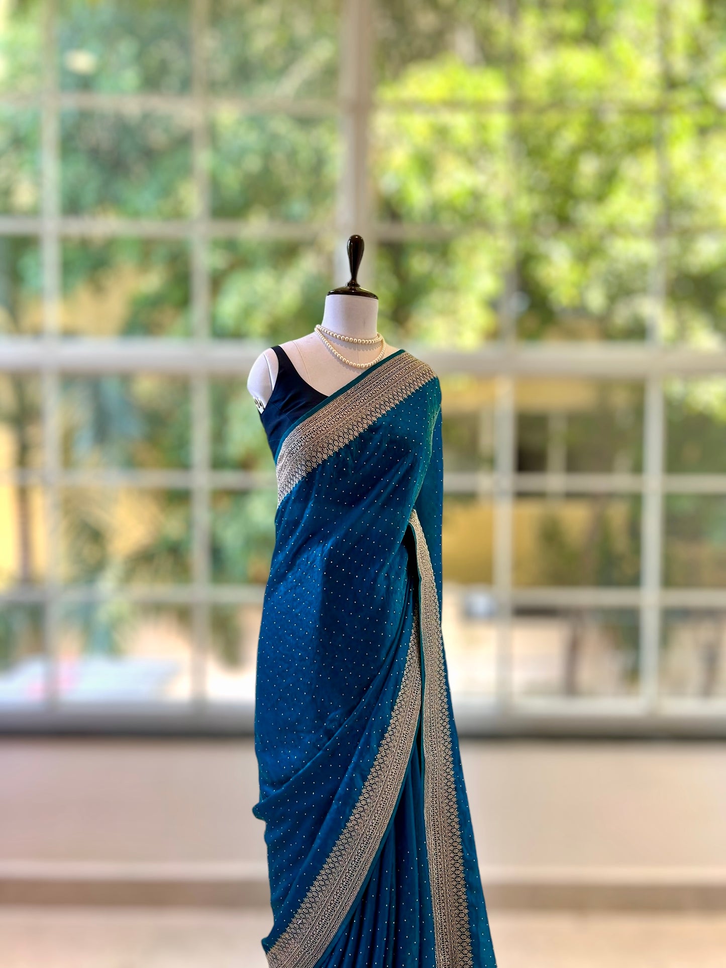 Rama shimmer organza saree