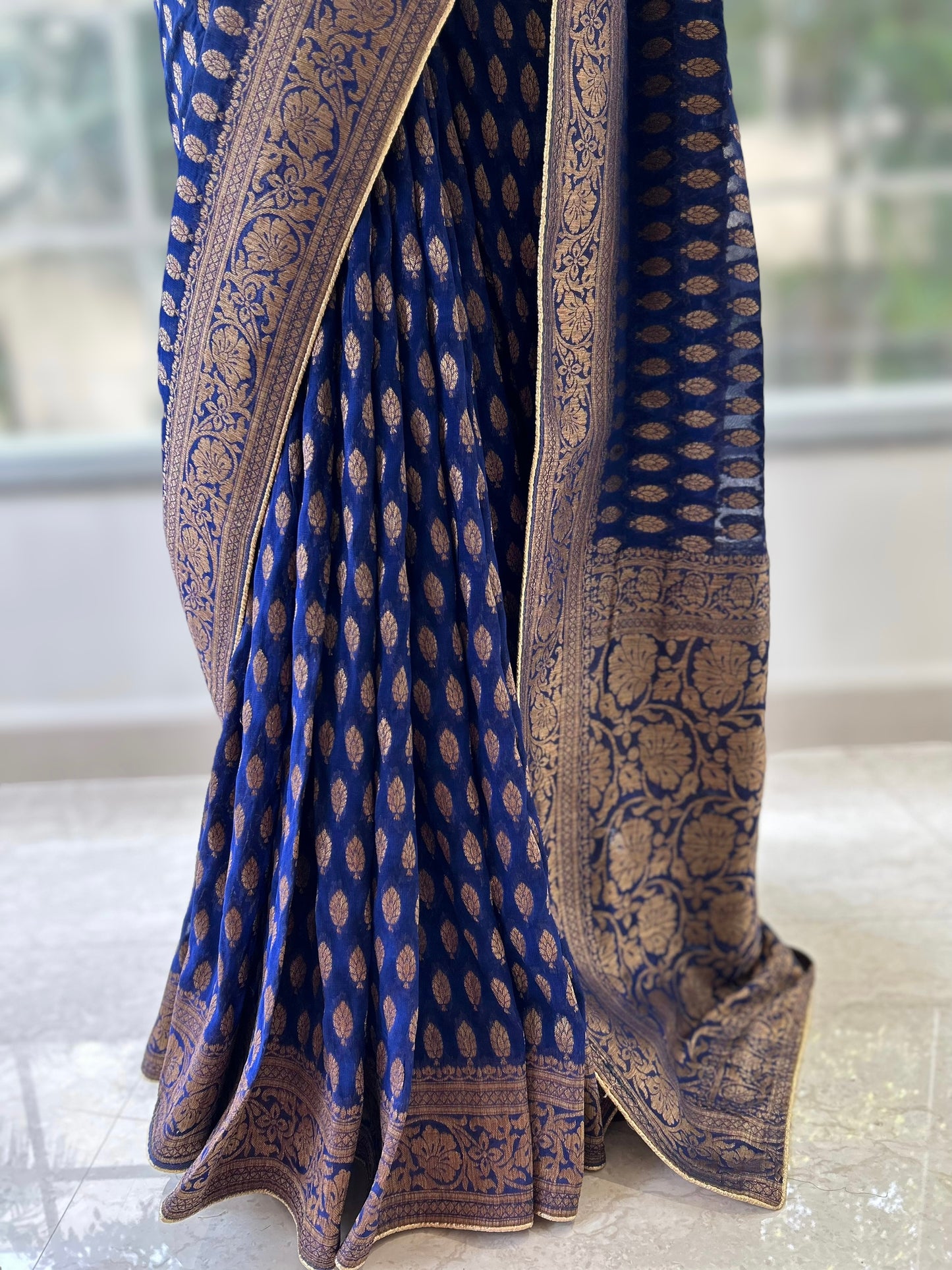 Peacock blue georgette saree