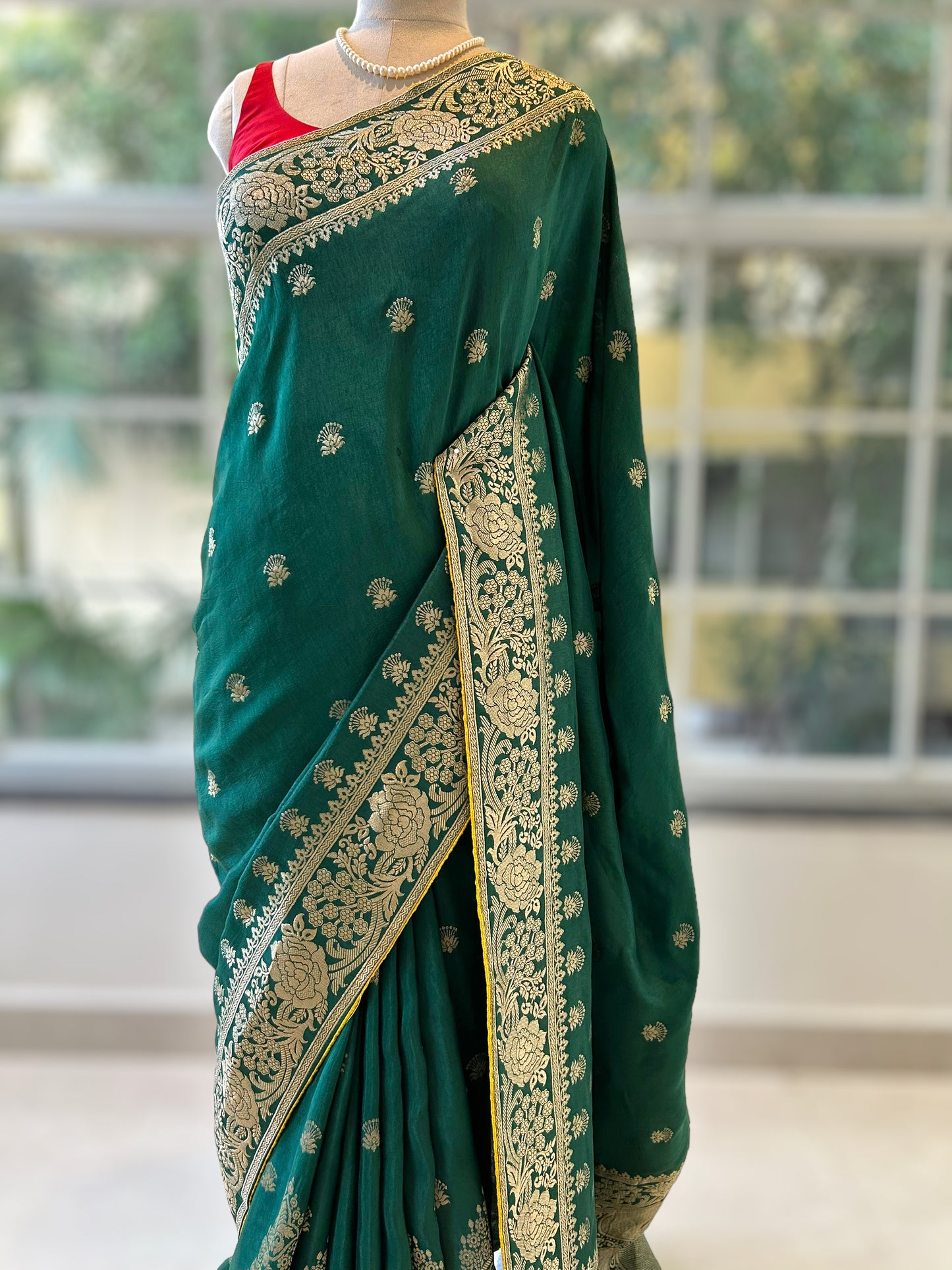 Bottle green zariwork saree