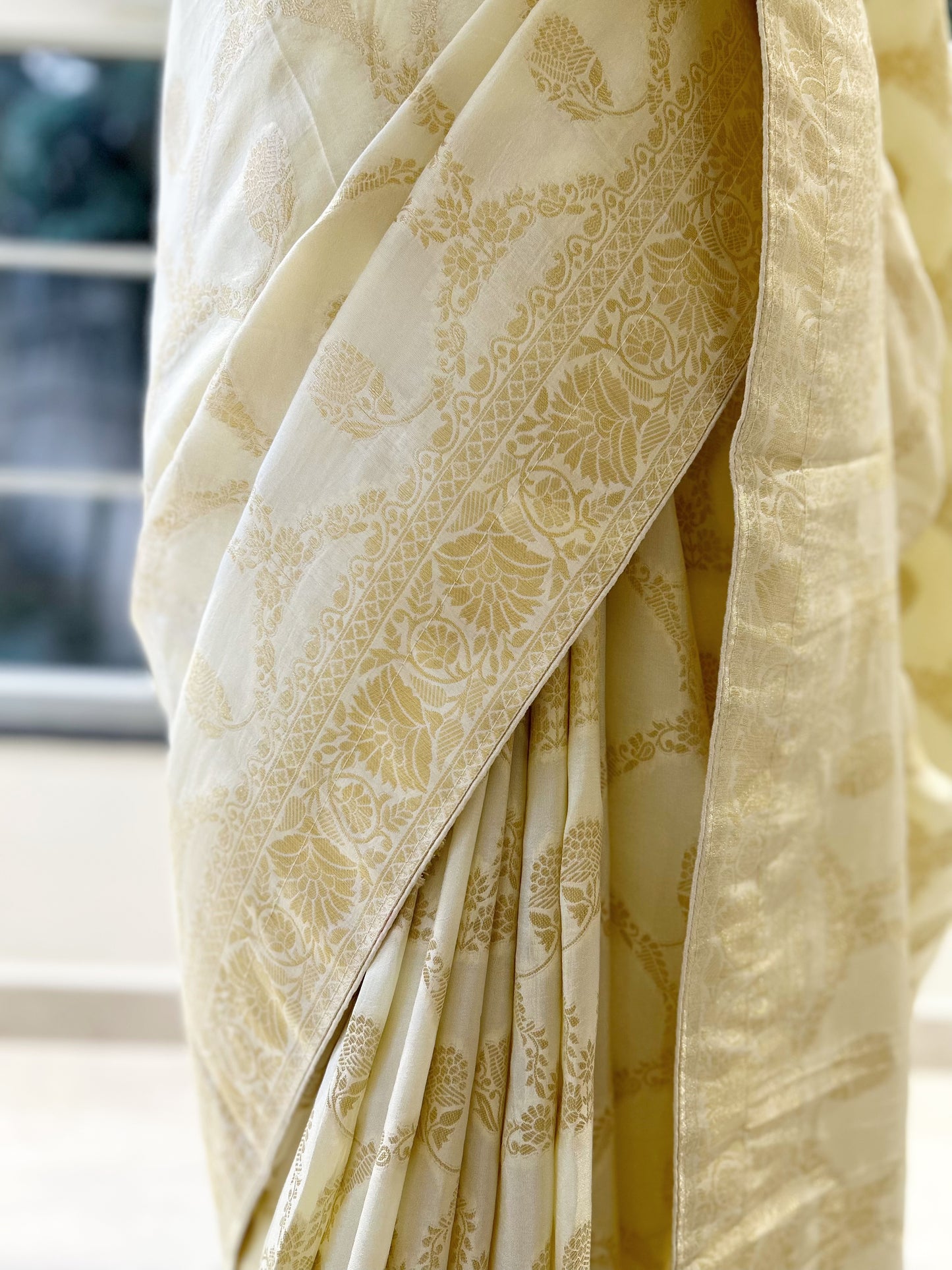 Off white pure dola silk saree