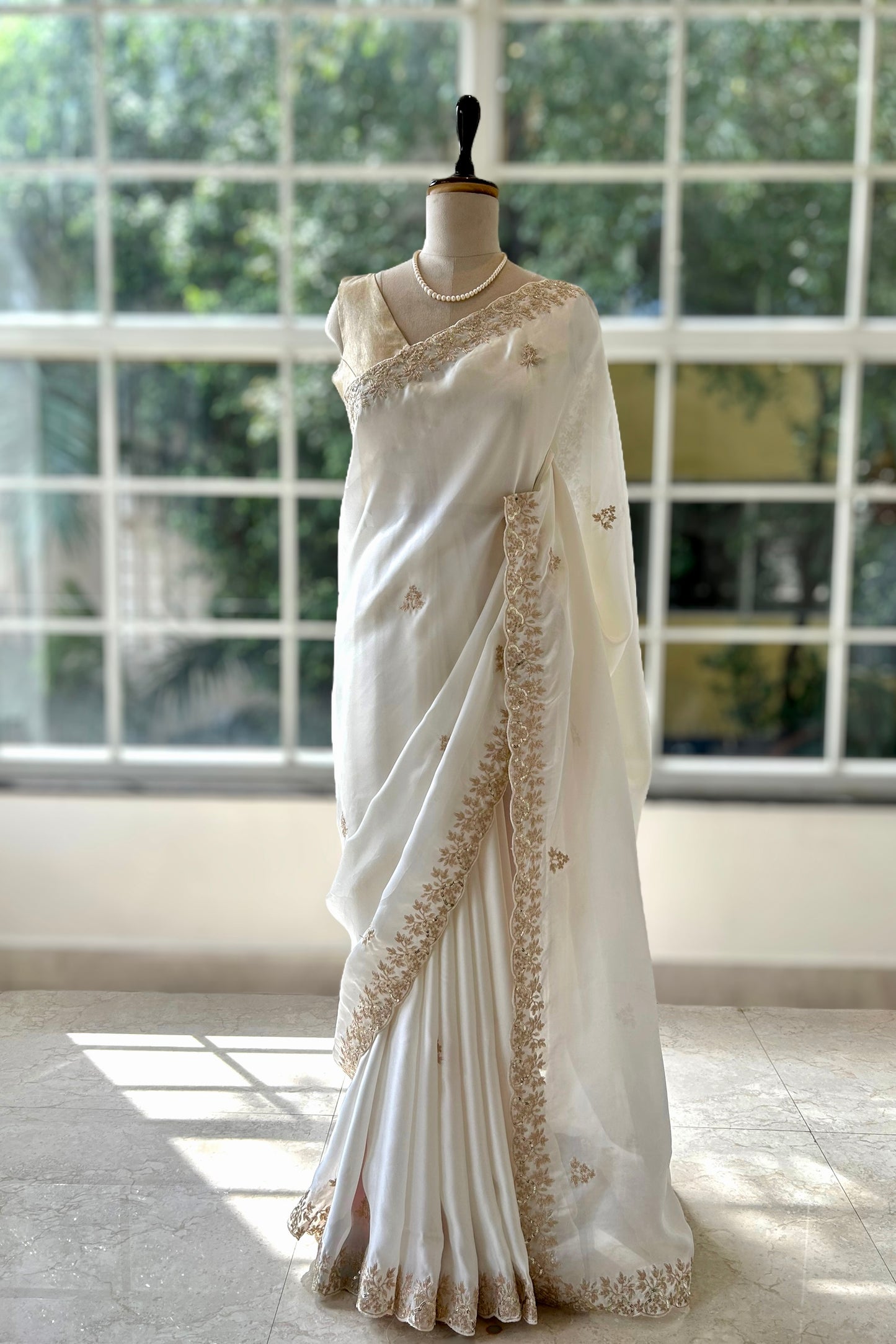 Satin chiffon aari work saree - White