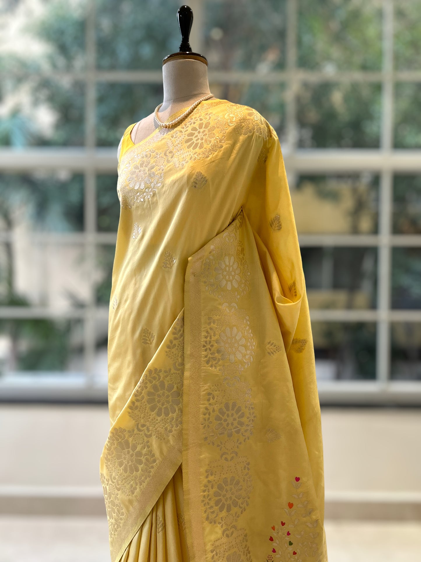 Pastel yellow soft silk saree