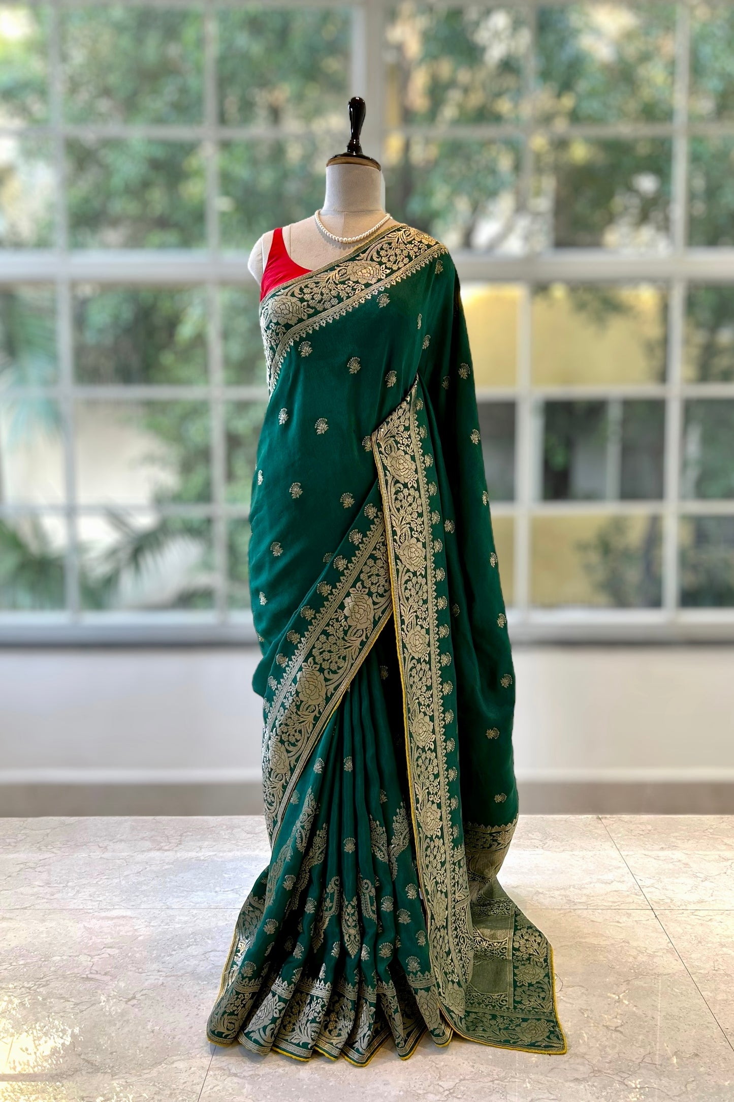 Bottle green zariwork saree