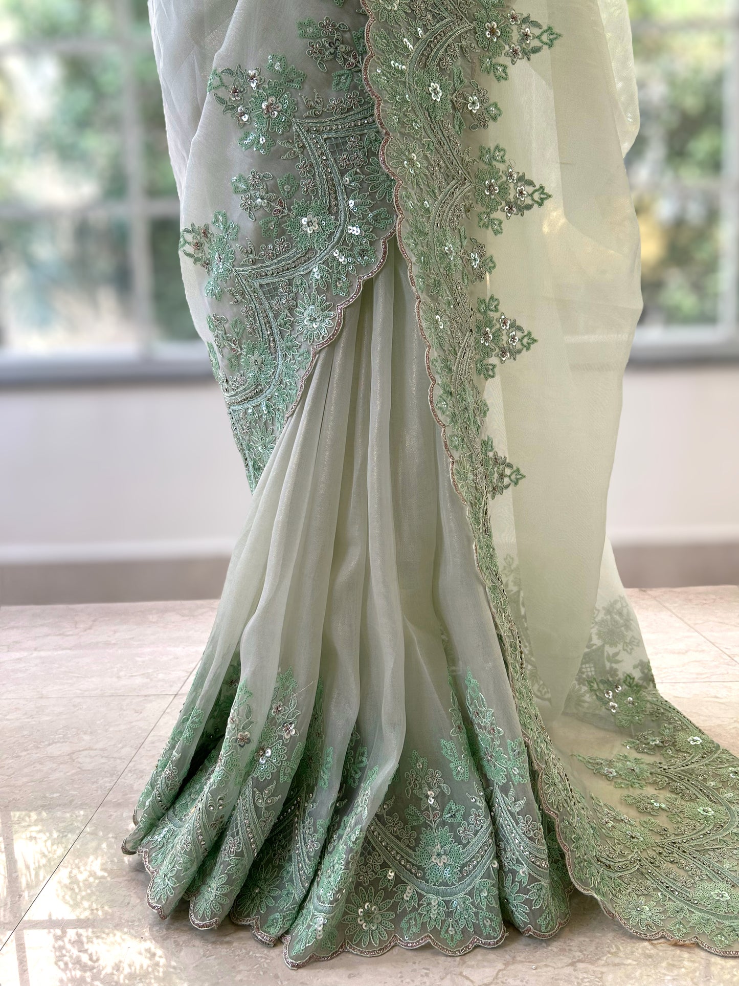 Green embellished organza saree